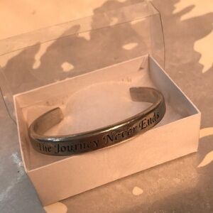 #Bracelet silver tone cuff near 3 inch diameter medium weight with wording